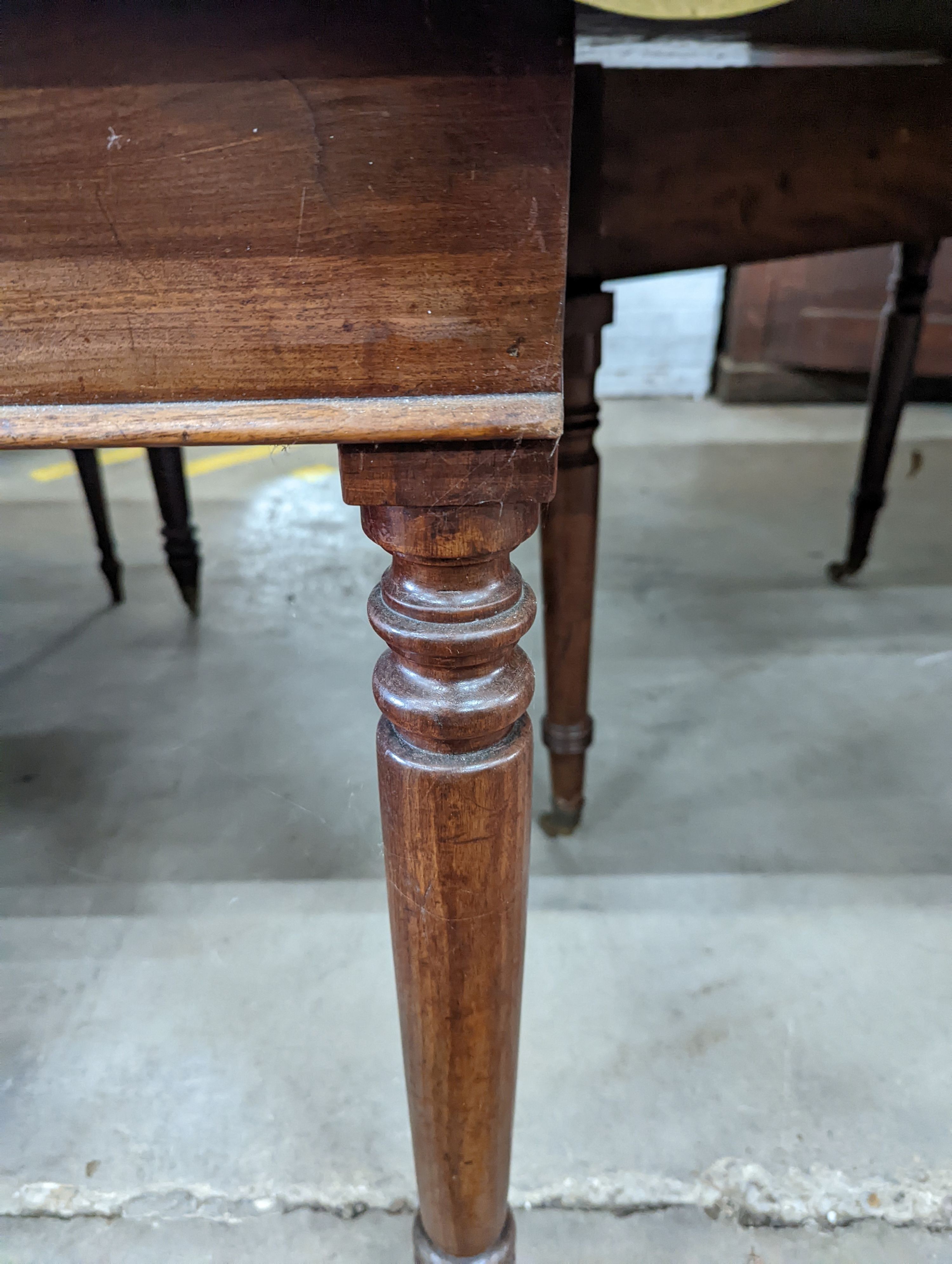 A George IV mahogany D end drop leaf extending dining table, 266cm extended, width 121cm, height 74cm